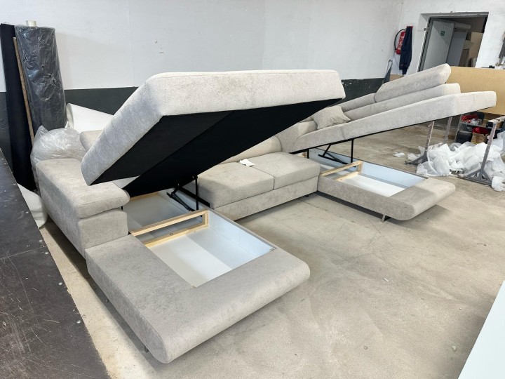 Narożnik Rogal U z automatem Delfin i regulowanymi zagłówkami – nowoczesny narożnik z funkcją spania i pojemnikami