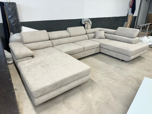 Narożnik Rogal U z automatem Delfin i regulowanymi zagłówkami – nowoczesny narożnik z funkcją spania i pojemnikami