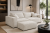Nowoczesna sofa Novu10 z pufą w kolorze kremowym – aranżacja salonu, tkanina Cremona